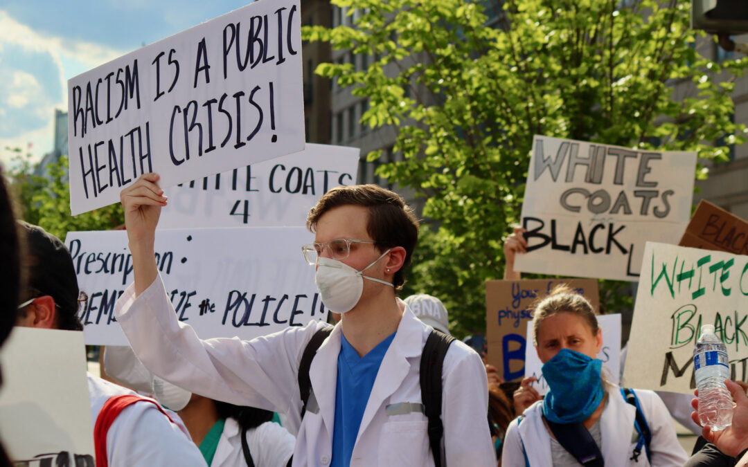 Healthcare workers protesting Racism is a Public Health Crisis